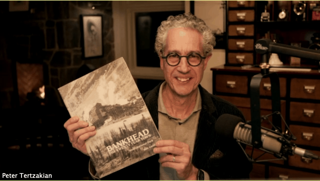 Peter Tertzakian holds up Bankhead: The Twenty Year Town book